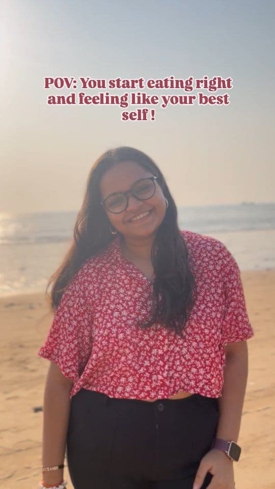 Irika Goyal smiling on a beach, with the caption 'POV: You start eating right and feeling like your best self!'